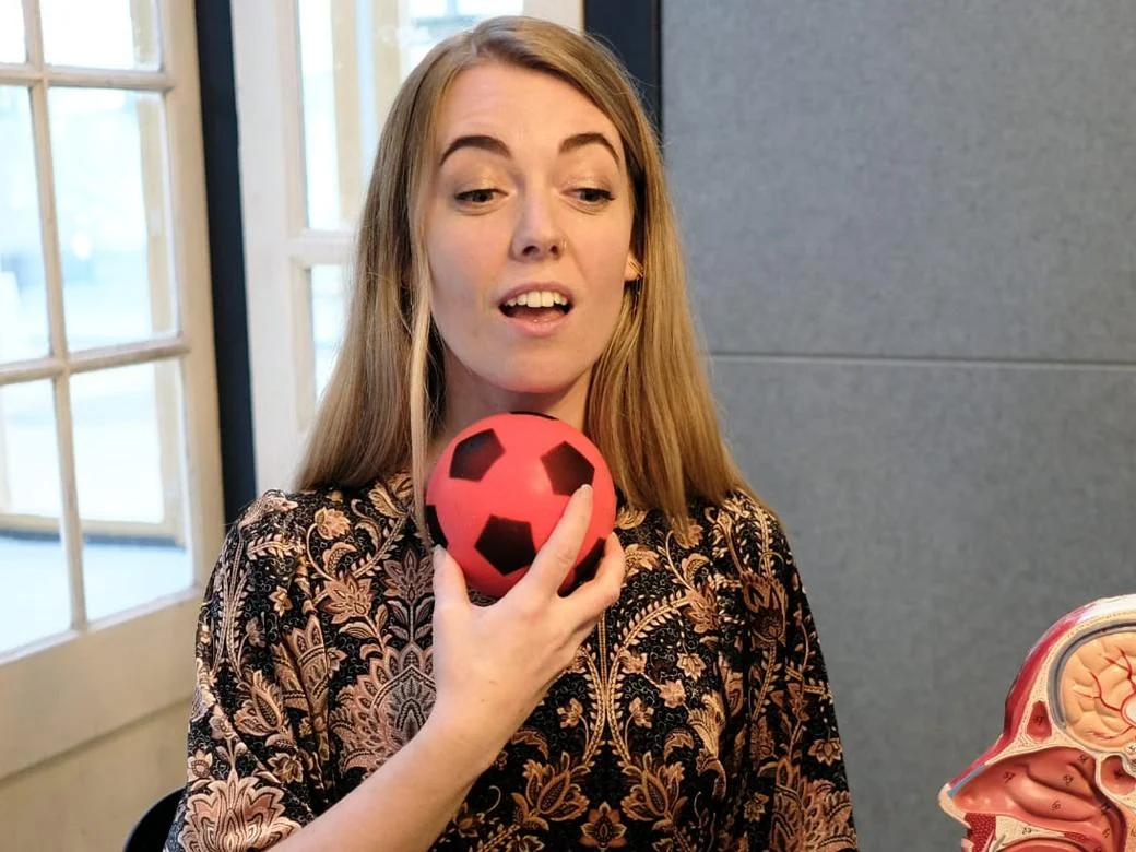 Elise using a ball to practise sounds